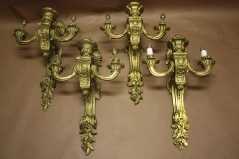 set of four large giltwood wall lights
