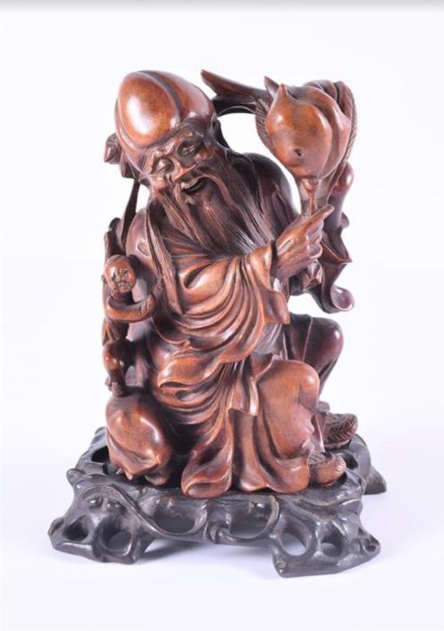 a c19th chinese carved hardwood figure