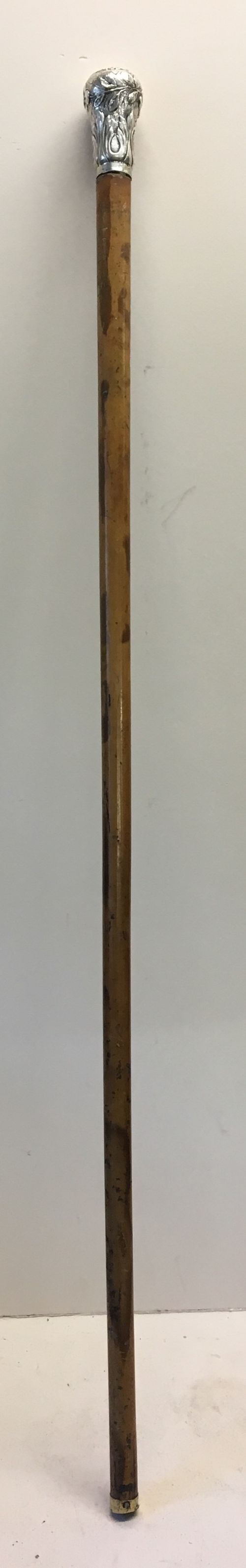 c19th walking cane with white metal embossed handle