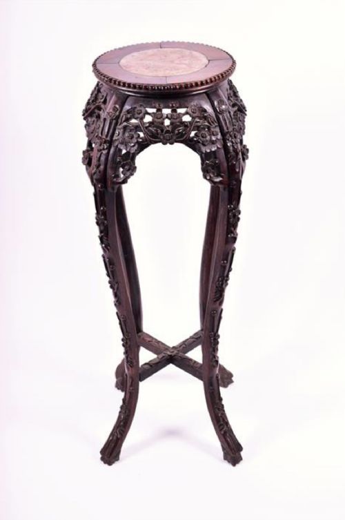 a chinese carved hardwood jardinaire stand