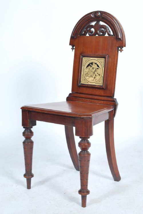 a c19th mahogany hall chair with inset moyr smith tile depicting cymbeline