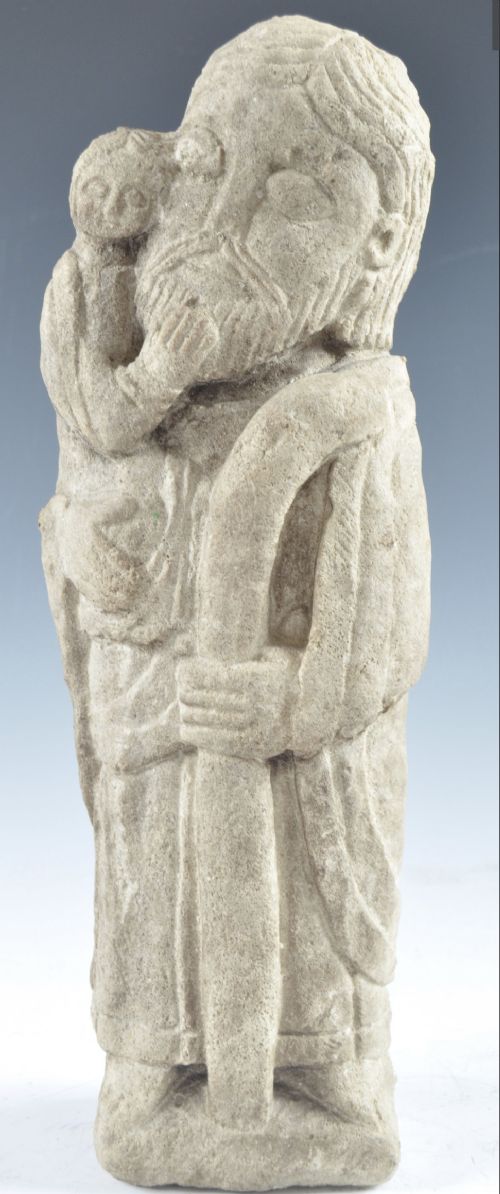 a medieval carved limestone figure of st christopher