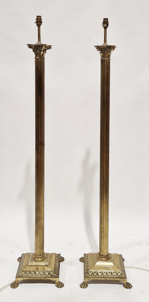 pair of corinthian brass standard lamps