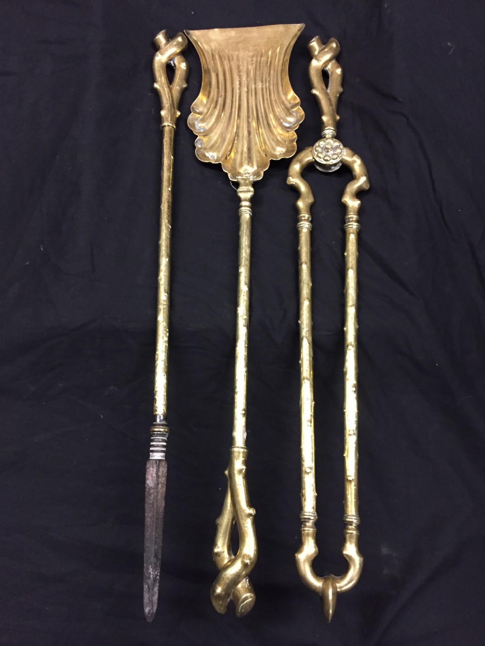fine set of brass fire irons of naturalistic form