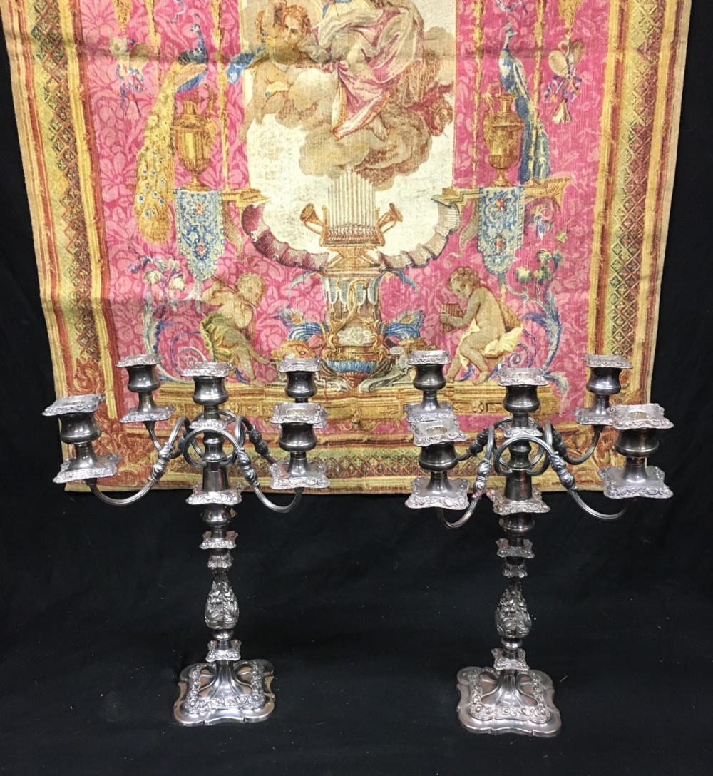 pair of silver plated five light candelabra