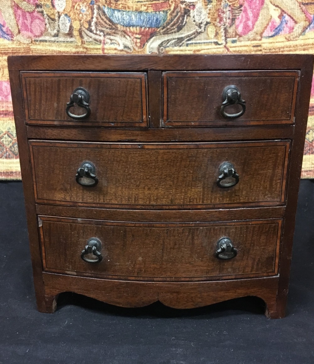 c19th bow fronted miniature chest of drawers