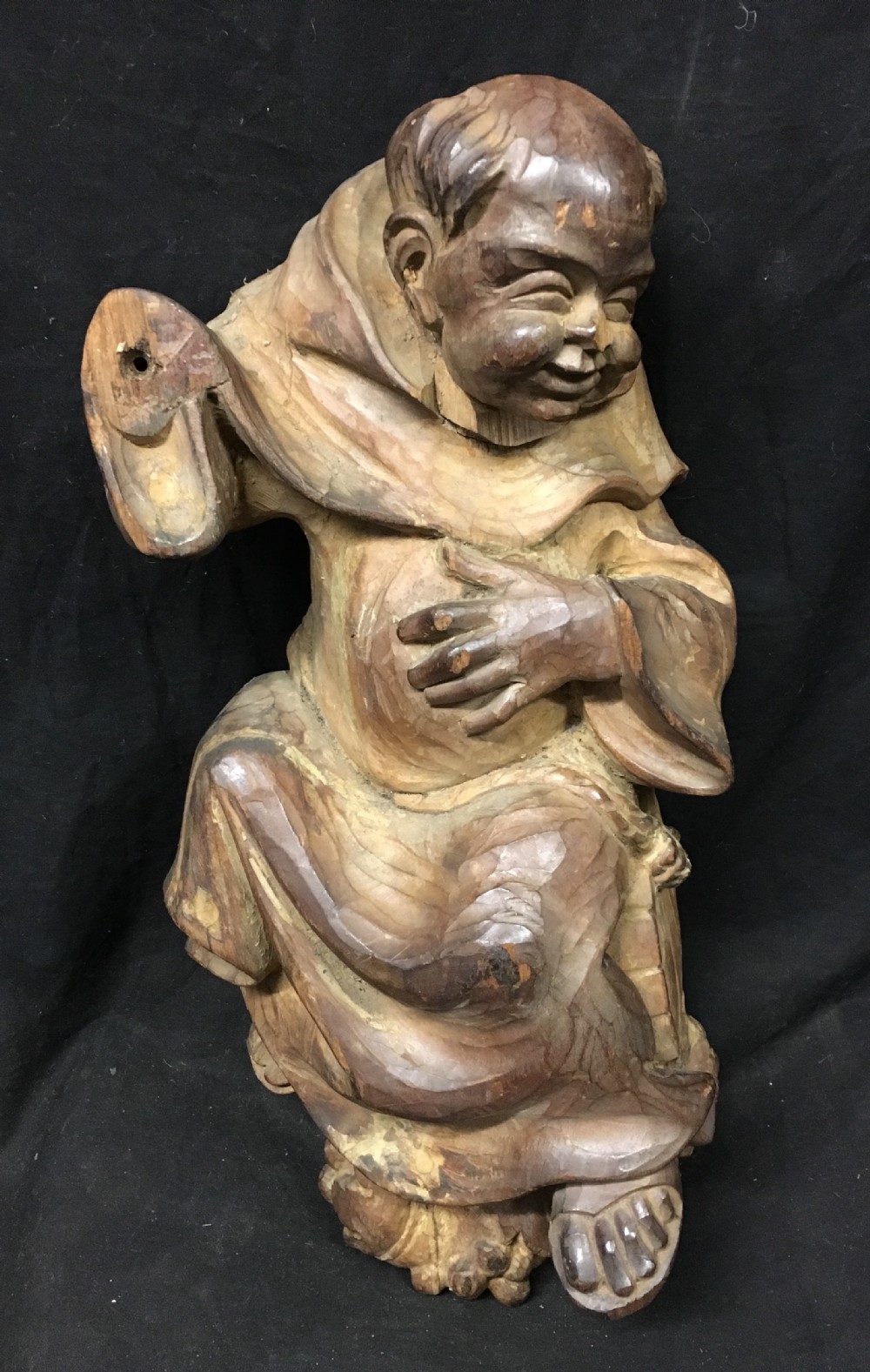 c19th large carving of a monk