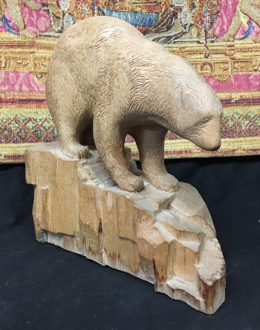 1930s limewood carving of a polar bear on naturalistic base
