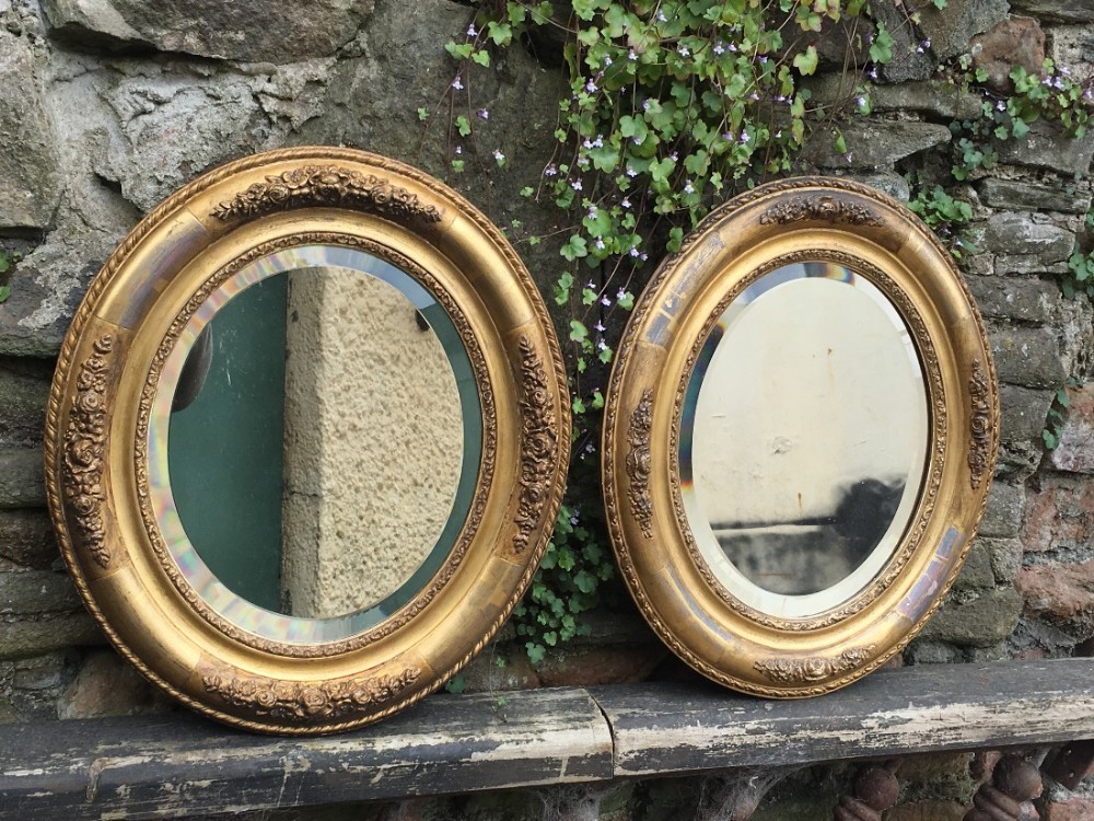 c19th matched pair of small oval mirrors