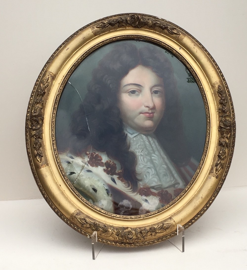 c19th portrait of a nobleman painted on glass in an oval frame