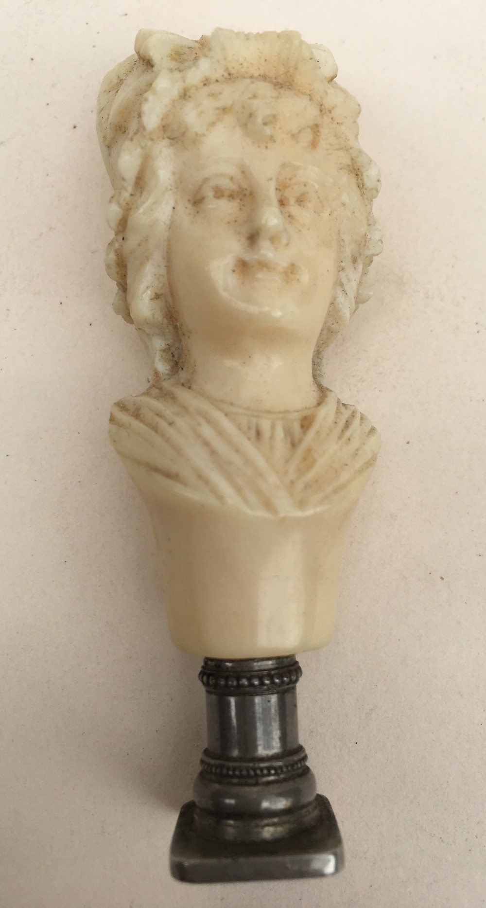 c19th carved ivory dieppe carving of a lady with a seal base