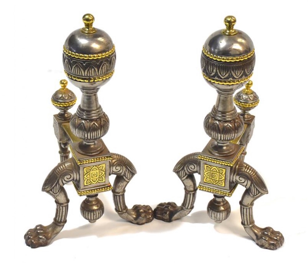 pair of steel and brass fire dogs
