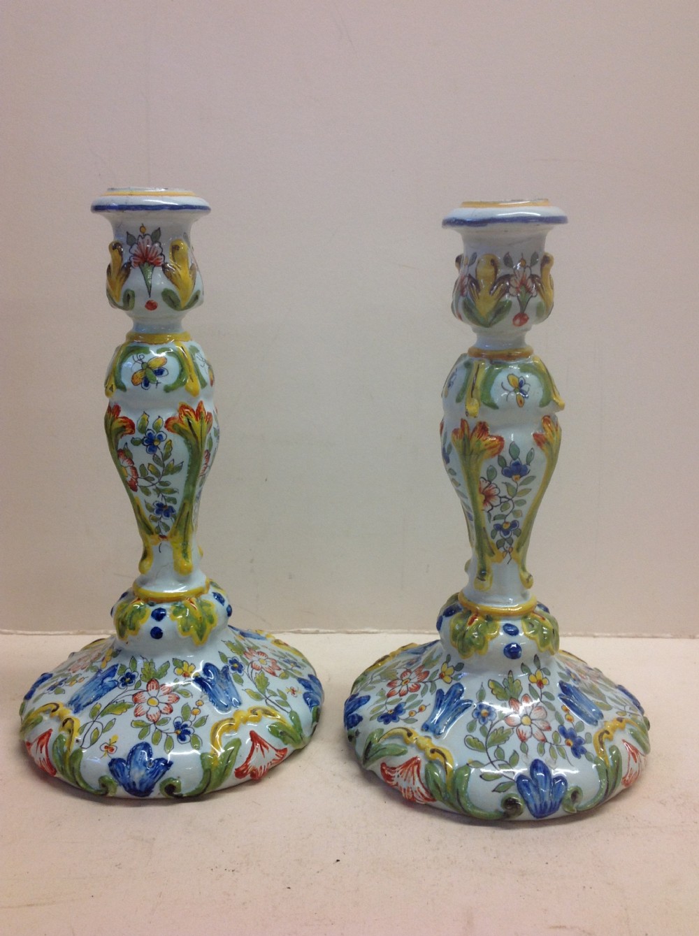 pair of french faence candlesticks