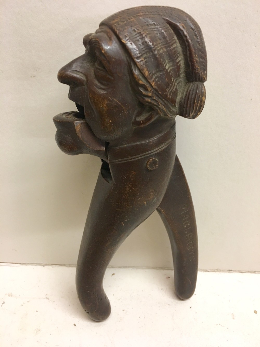 c19th swiss carving of a man modelled as a nut cracker