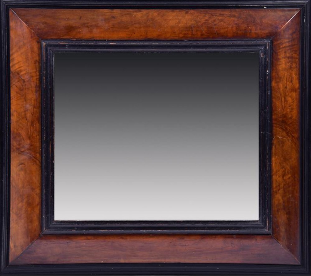 c18th cushion mirror in walnut and ebonised border