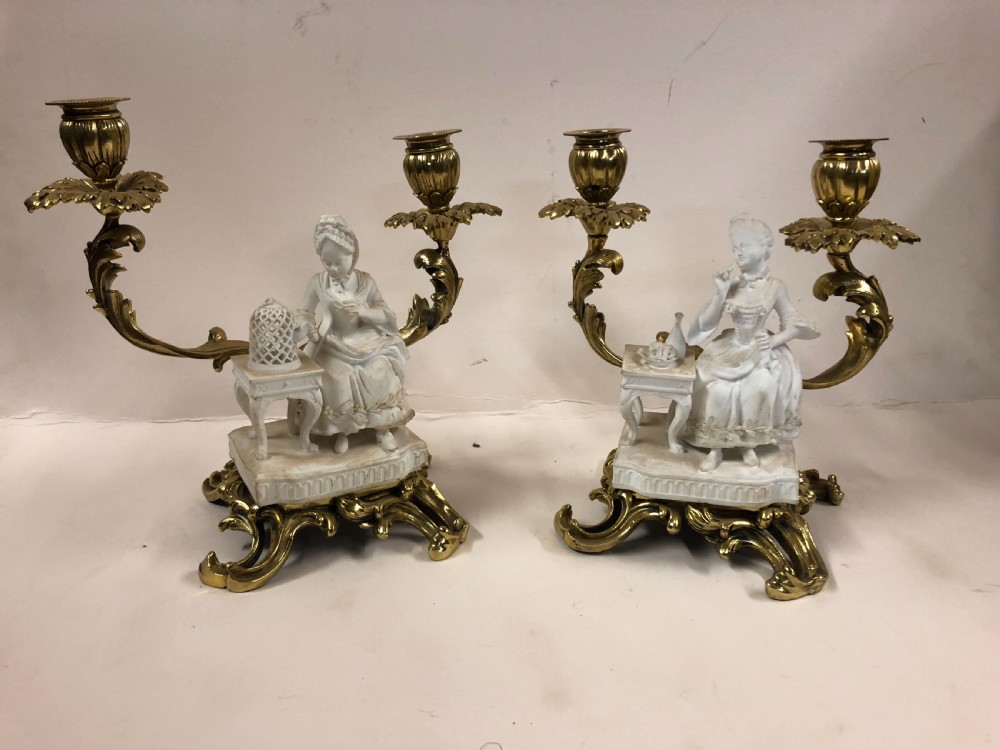 pair of ormolu candelabras with parian figures