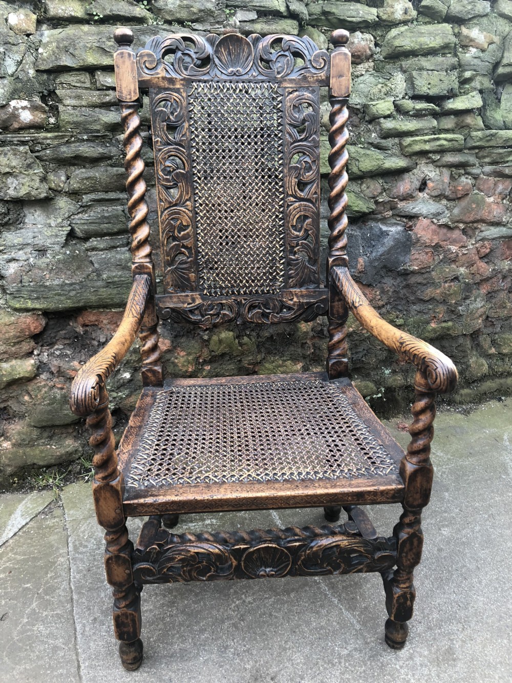 c17th elbow chair 168090 caned with walnut frame