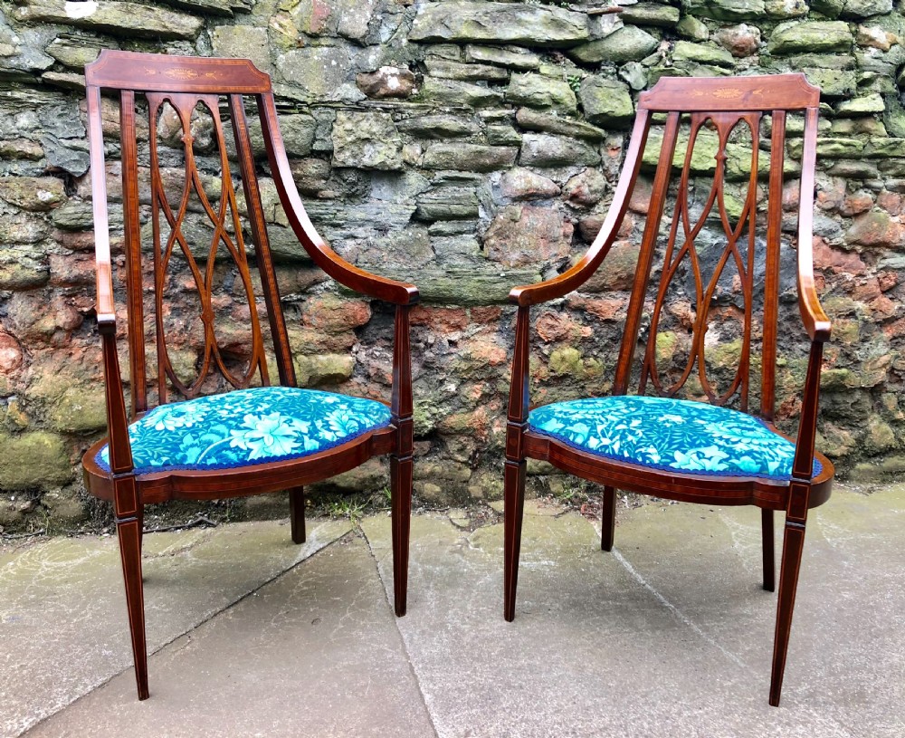 pair of edwardian armchairs