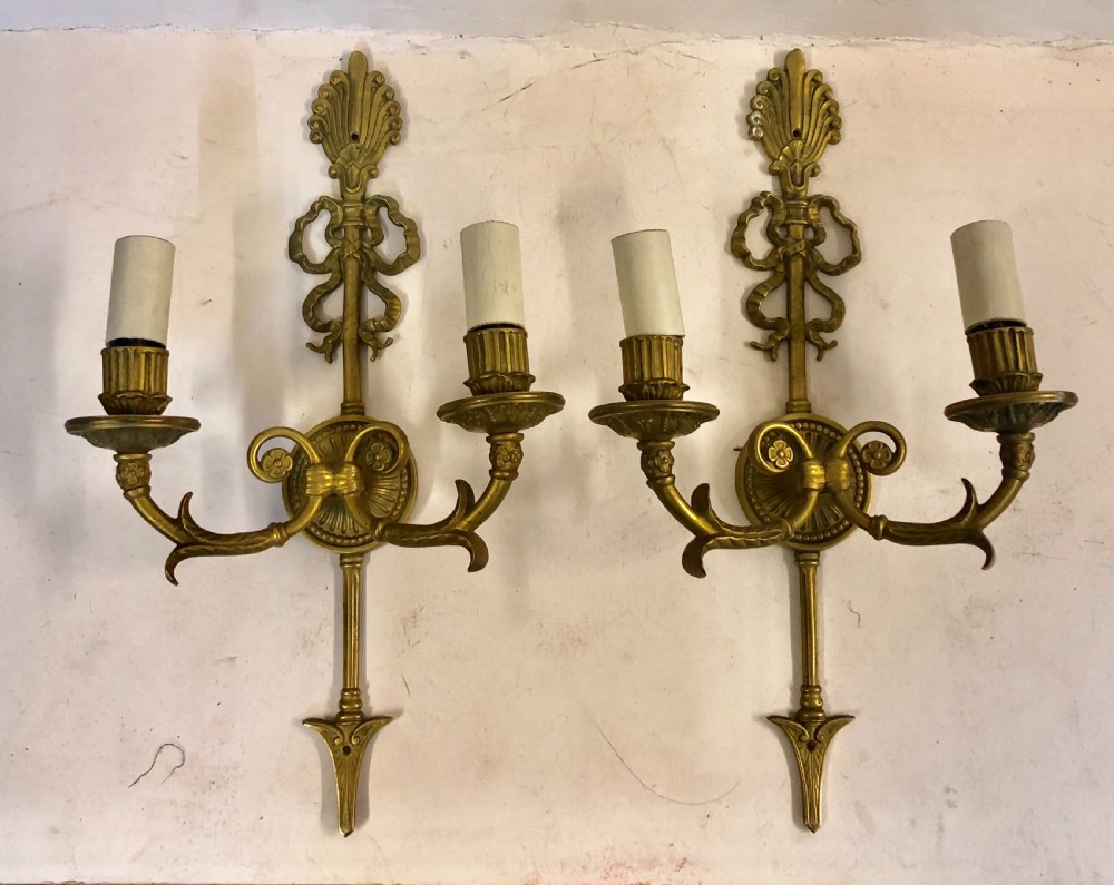 pair of brass wall lights