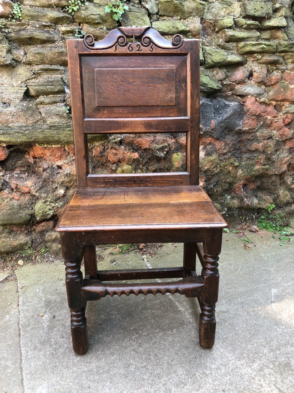 c17th oak chair with later date 1625