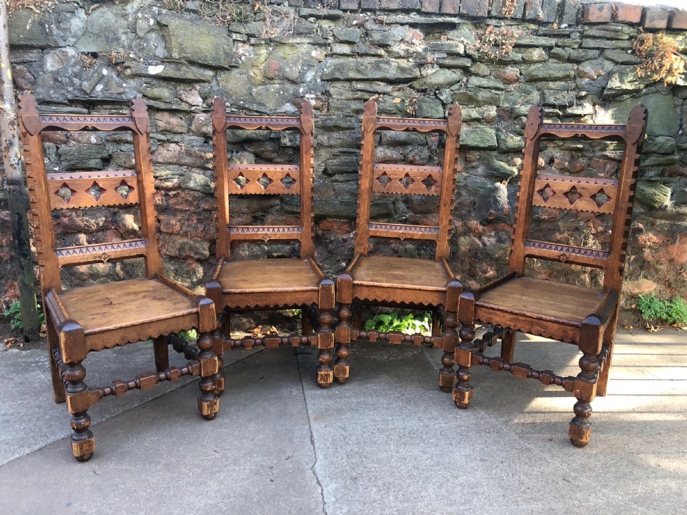 set of four pitch pine irish gothic chairs