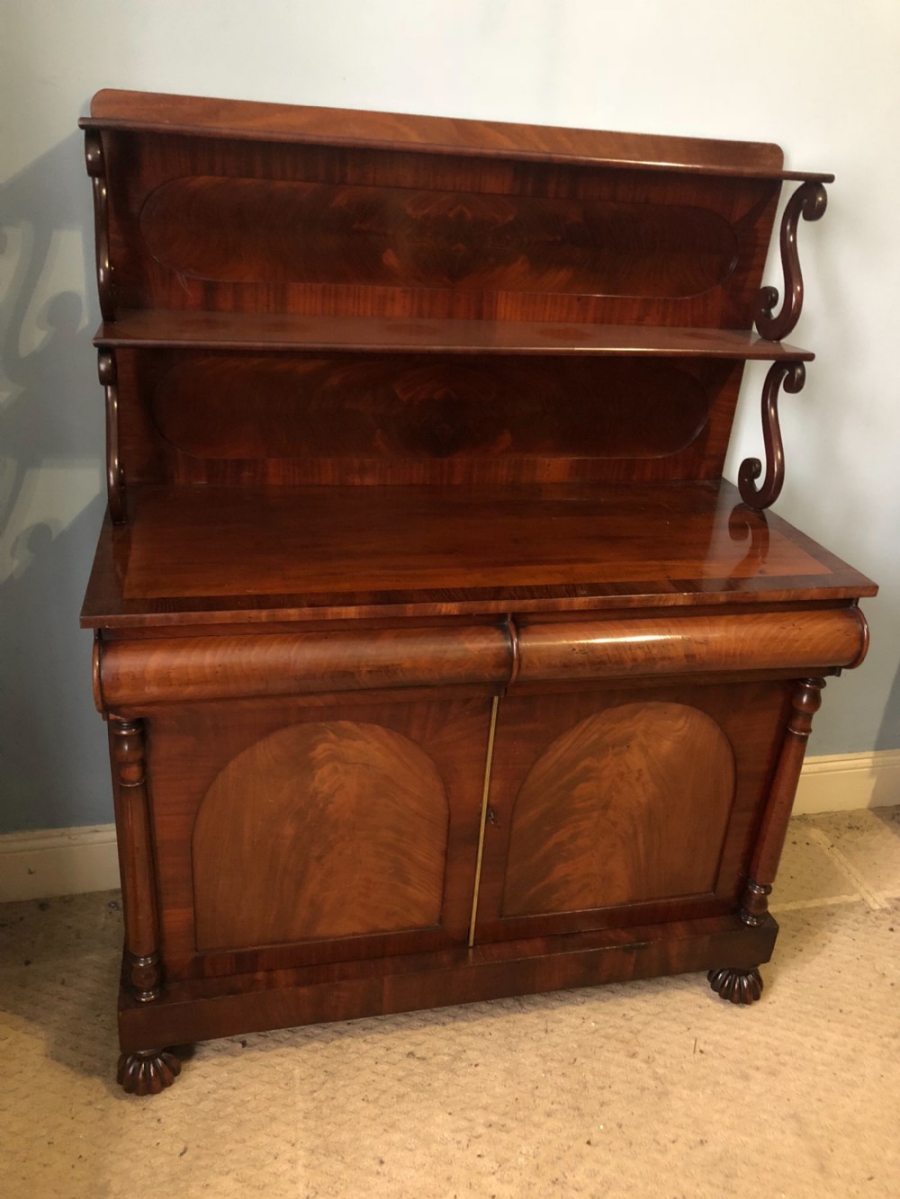 c19th mahogany chiffonier with c scrolled superstructure