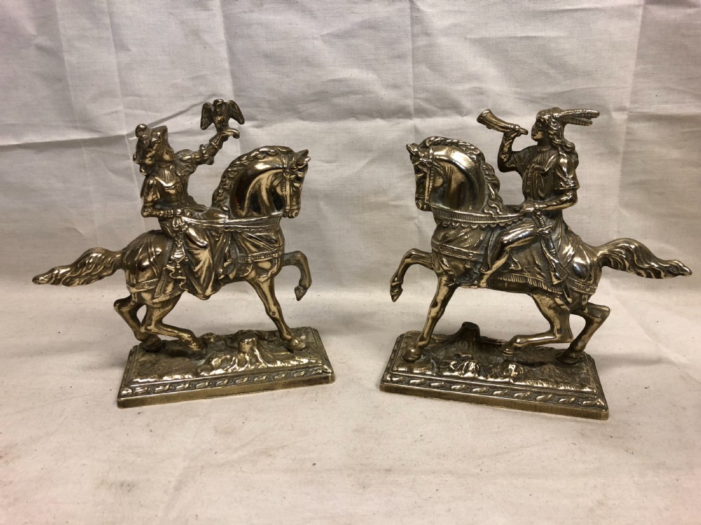 pair of brass equestrian figures