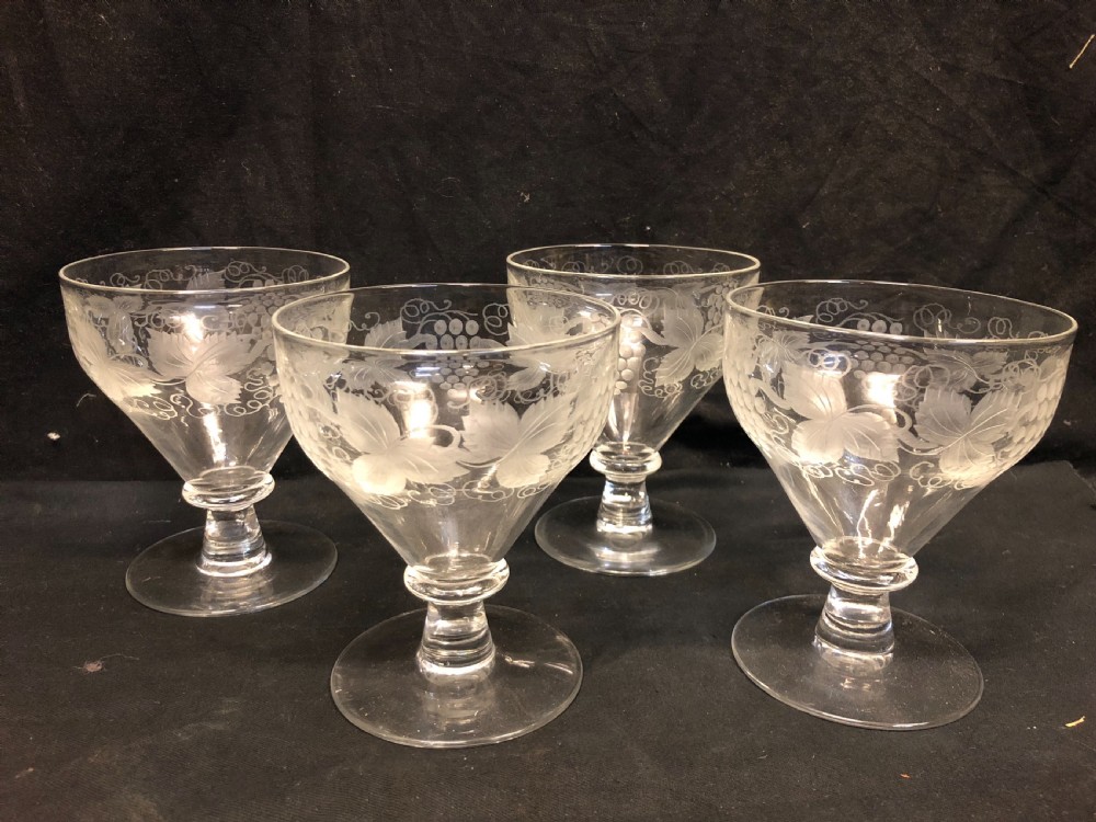 a set of four rummers wine glasses