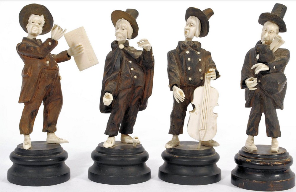 a collection of four black forest musicians