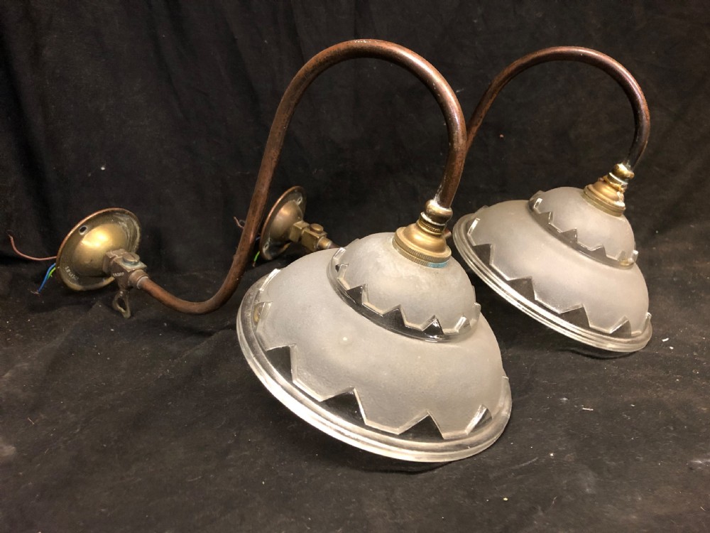 pair of edwardian brass wall lights with glass shades