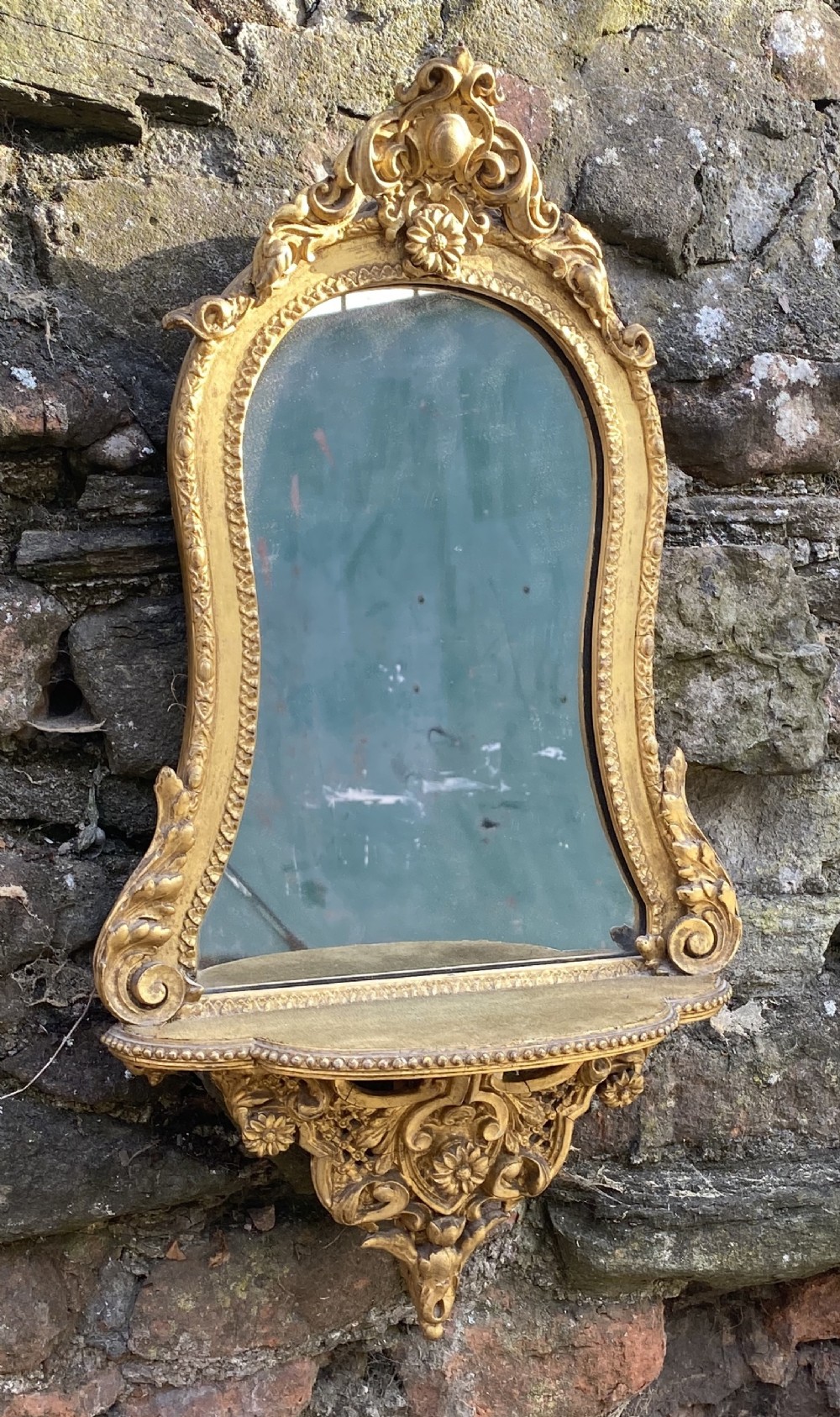 small gilded wall bracket mirror