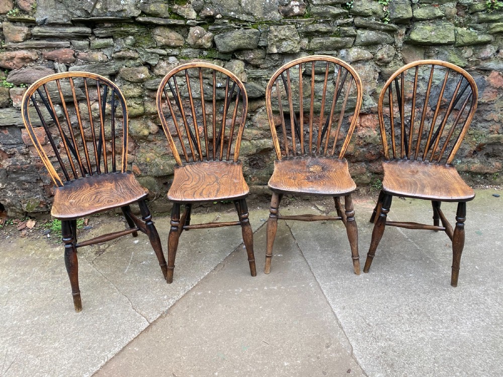 set of four windsor stick back chairs