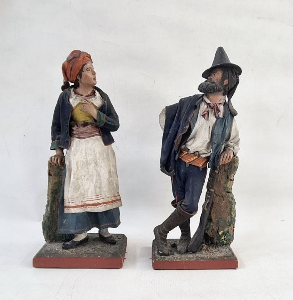 pair of papier mache and cork neopolitan figures