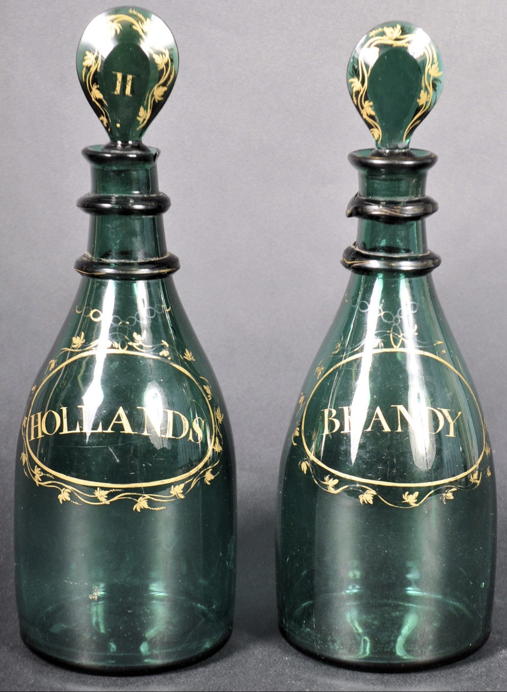 a pair of green glass decanters c17801800 bristol