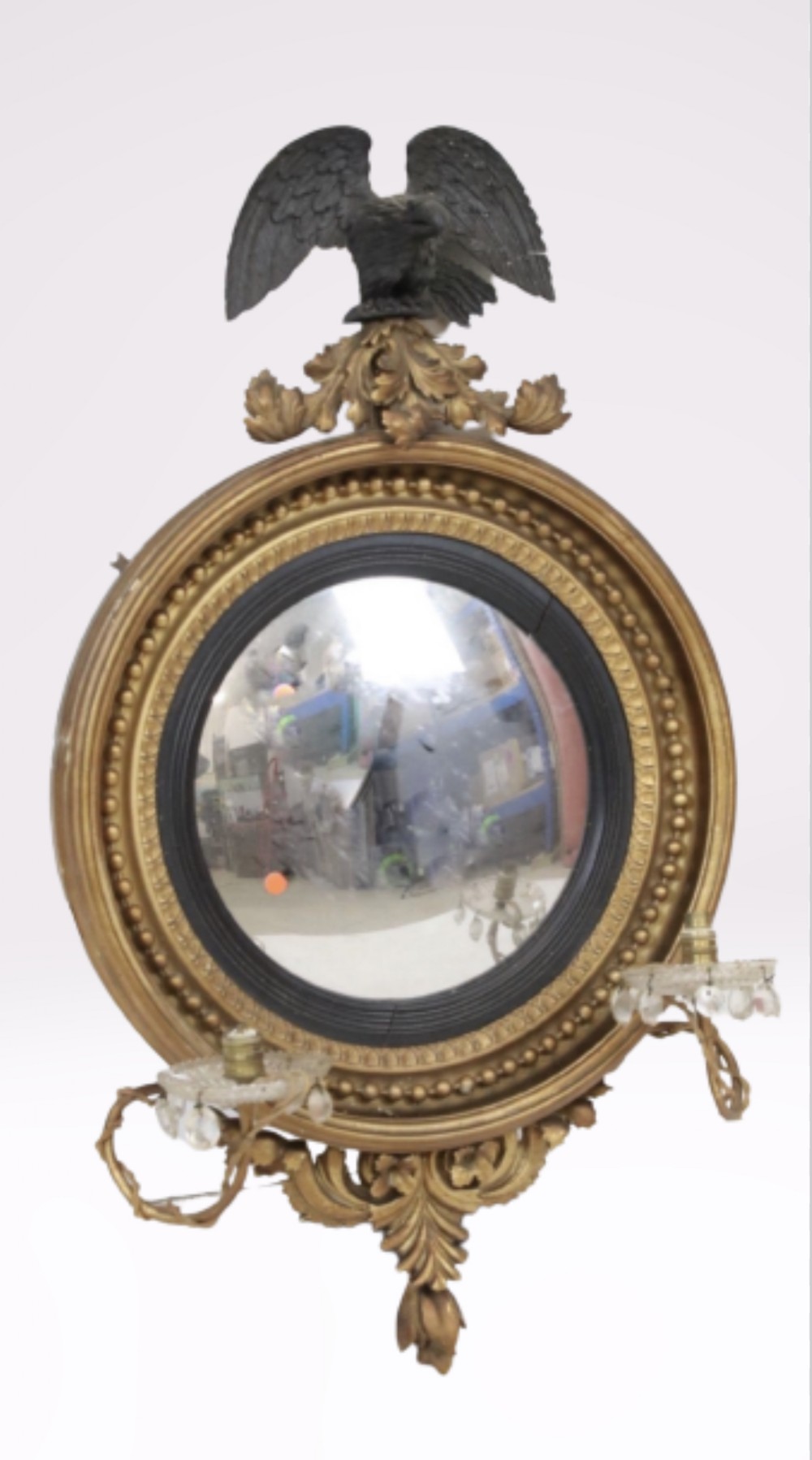 regency carved giltwood convex mirror