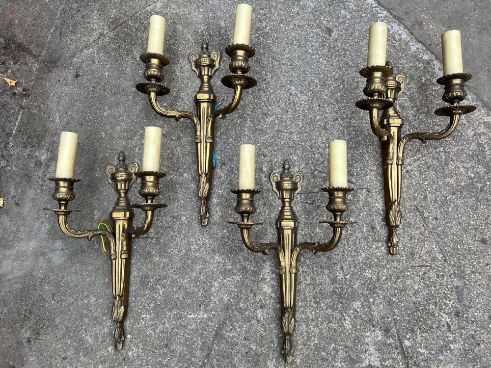 set of four brass wall lights in the adams style