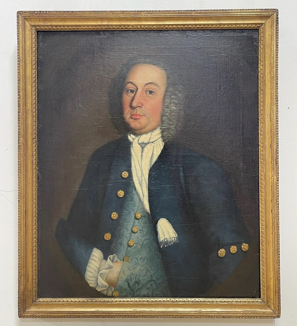 an c18th large oil on canvas of a gentleman in a blue coat