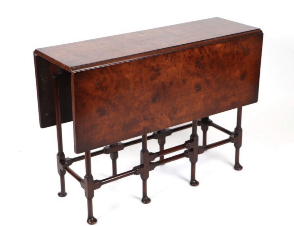 c18th style figured walnut veneered spider leg table