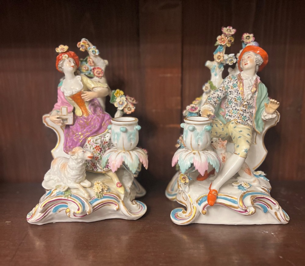 a pair of samson porcelain figural candlesticks