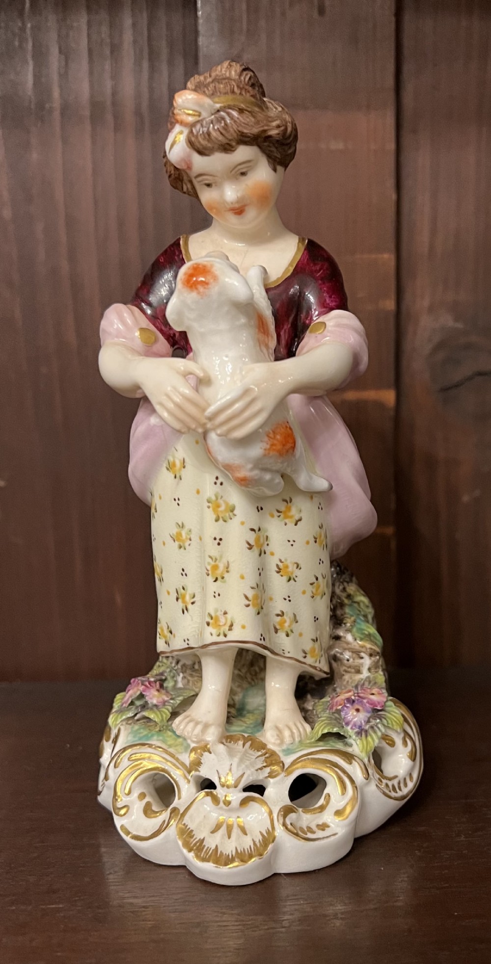 derby figure of young girl with dog