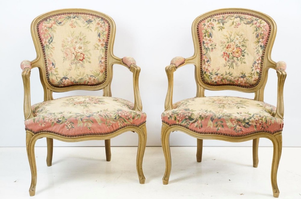 pair of painted french fautiel armchairs with aubasson style embroidery