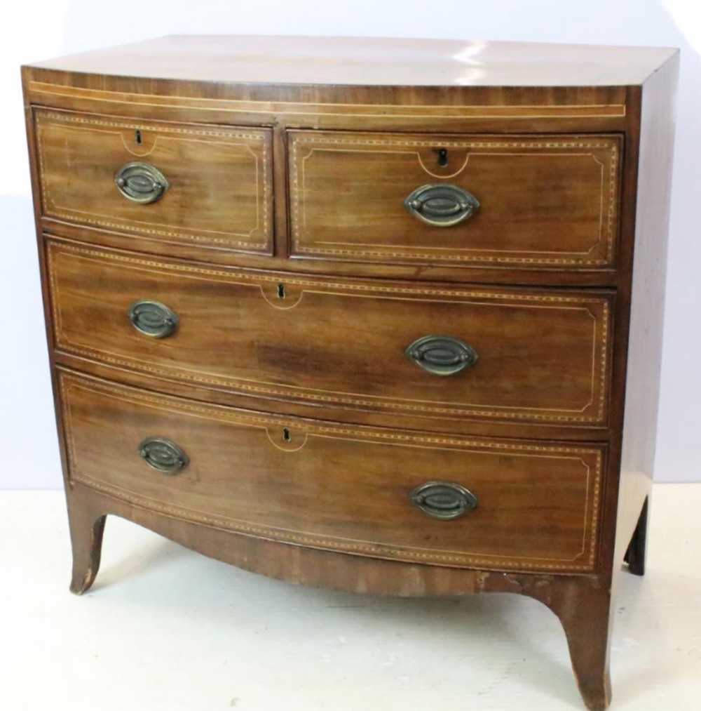 georgian small bow front inlaid chest of four drawers