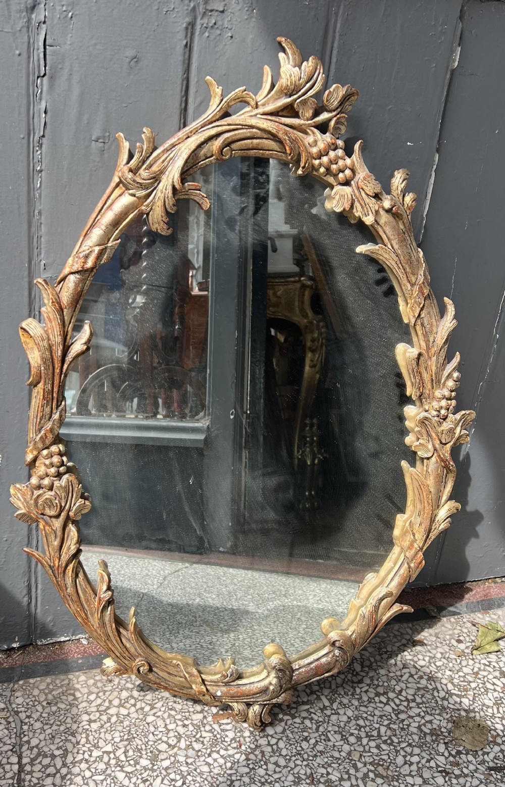 silver gilt carved wood oval mirror