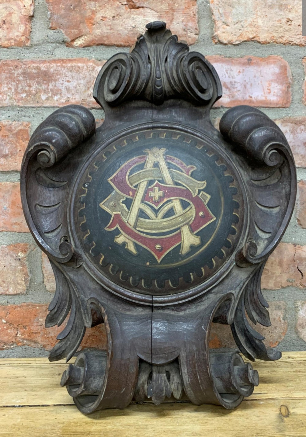 c19th carved oak cartouche with painted central section