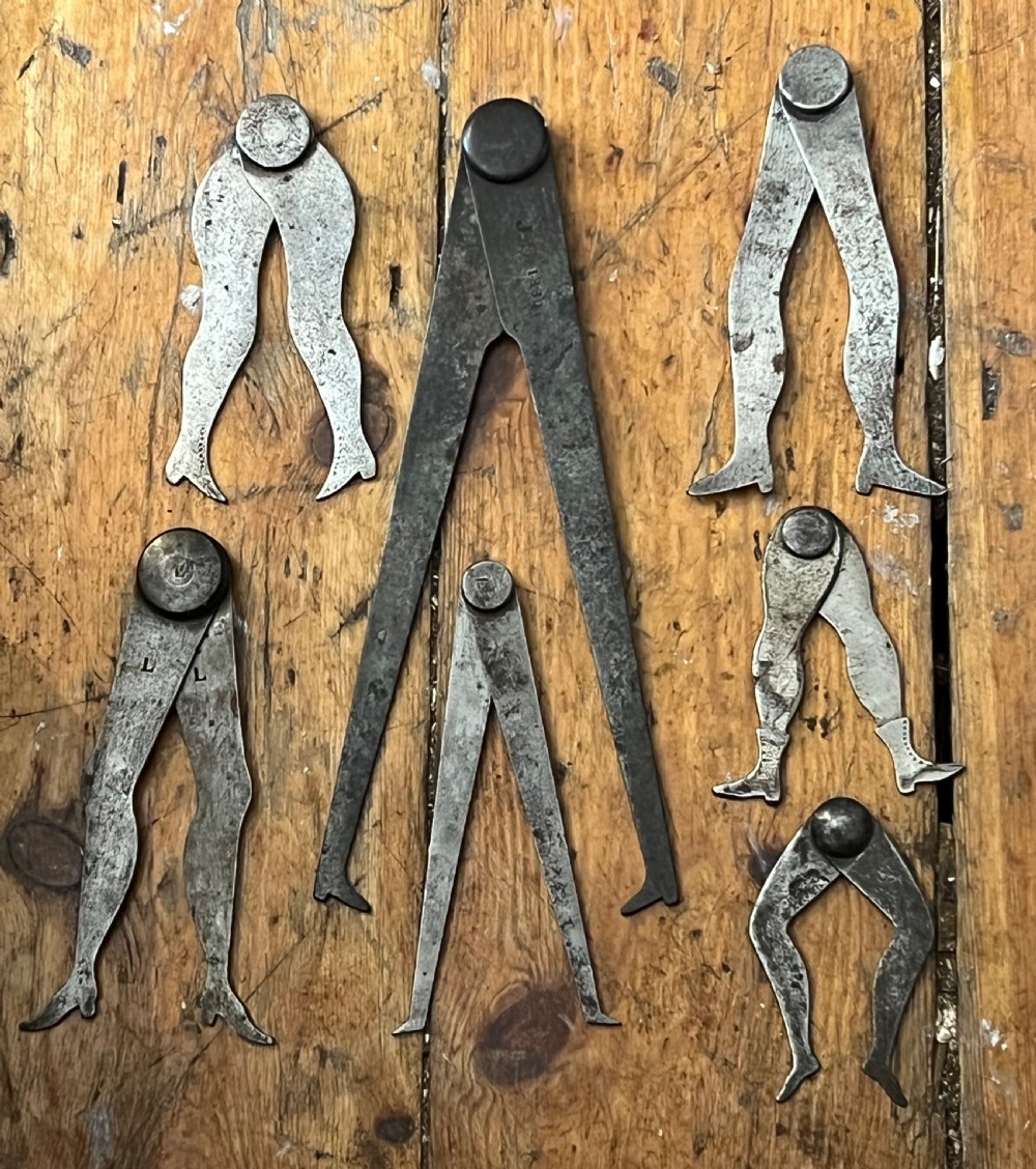 collection of c18th calipers shaped as ladies legs