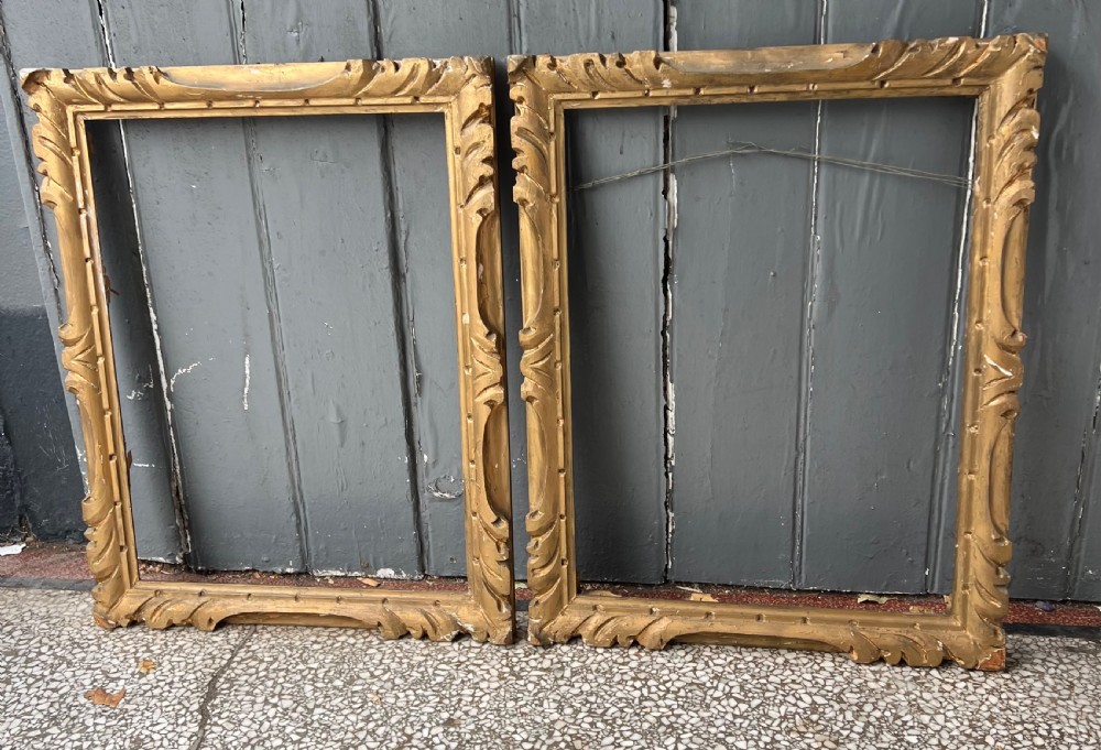 pair of carved giltwood portrait frames