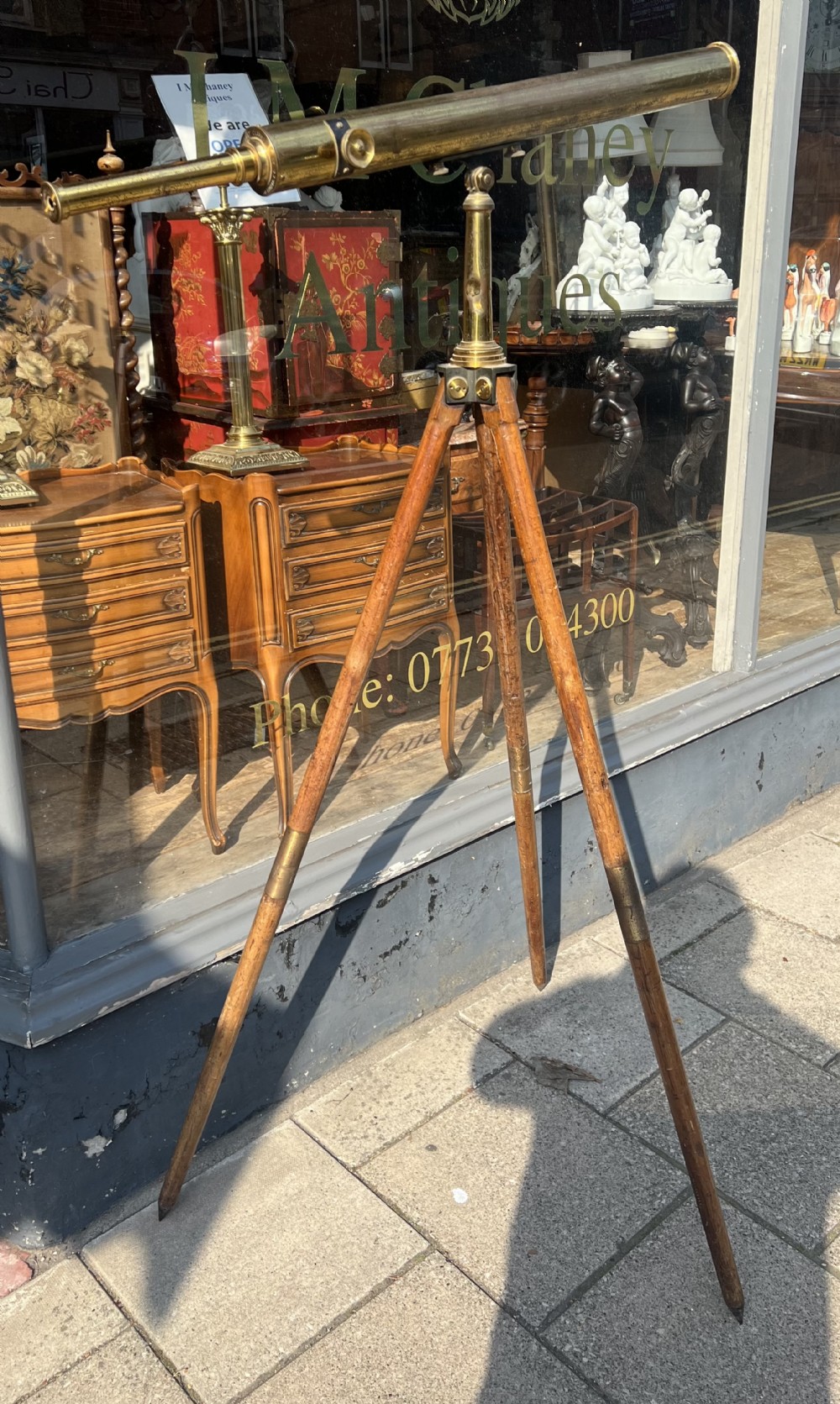 a large broadhurst clarkson co london terrestrial telescope on tripod base