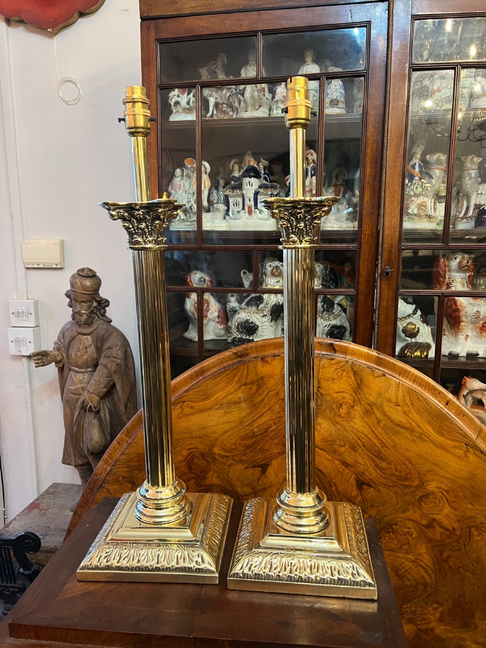 pair of large brass corinthian column table lamps