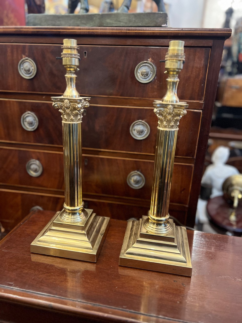 pair of corinthian column polished brass table lamps