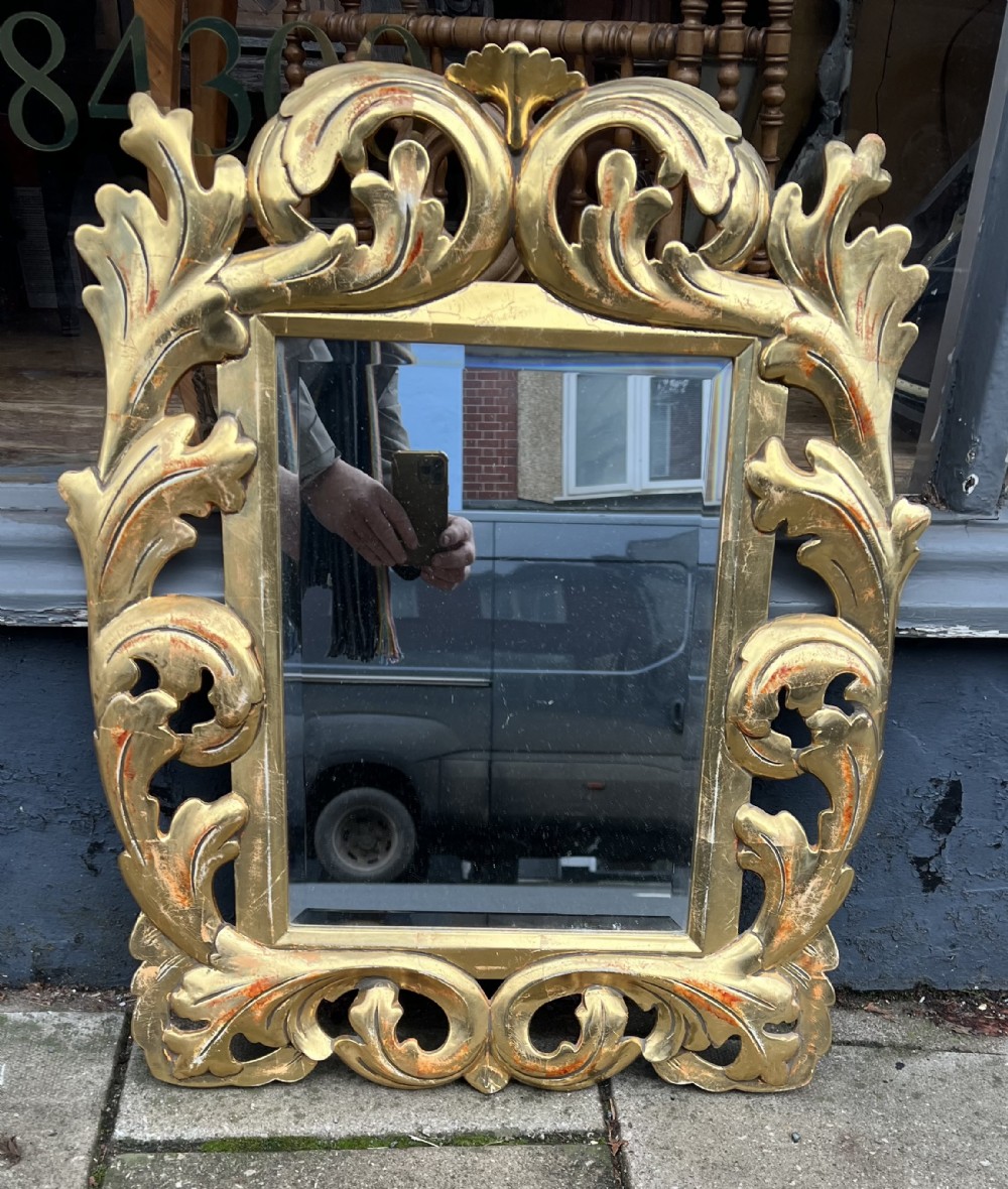 italian carved giltwood mirror